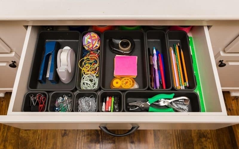 Phot showing a drawer with organized items