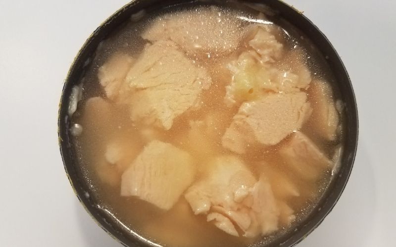 Photo of a canned chicken soaked in some fluid