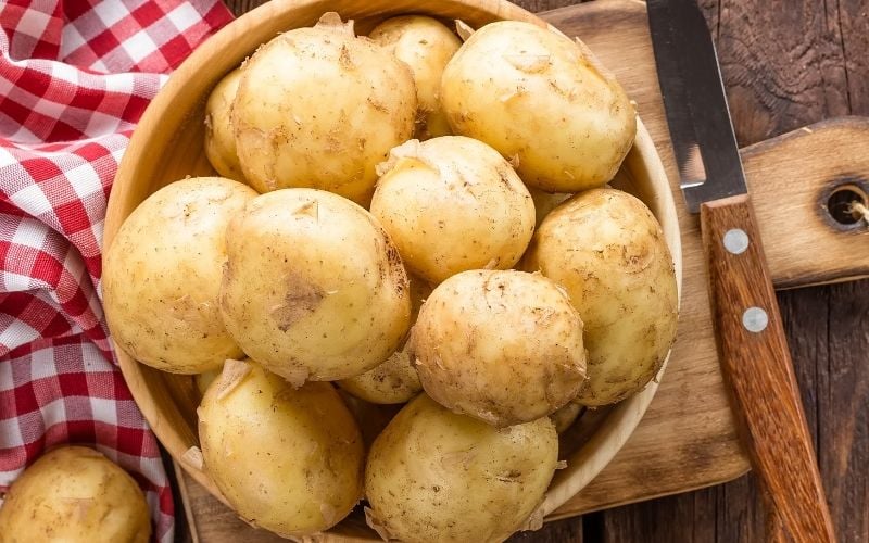 Photo of a white bowl with potatoes