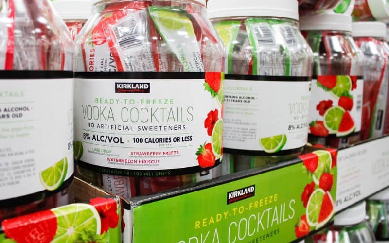 Photo of Kirkland brands with label Vodka Cocktails in jars placed on a shielf.