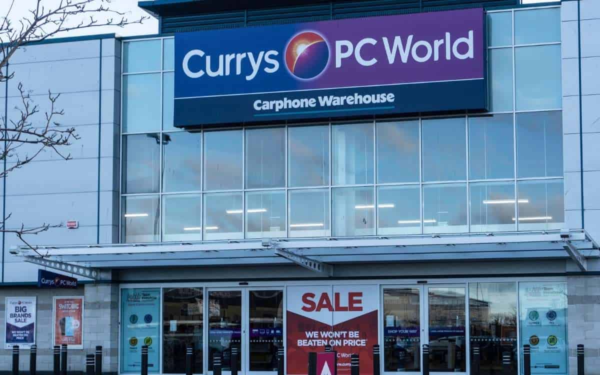 An establishment selling electronics with name Currys PC World above the entrance