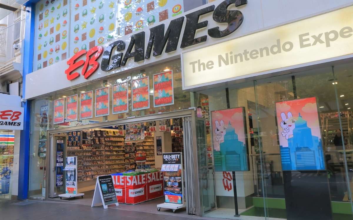 Photo of the EB Games store entrance with many posters of different video games