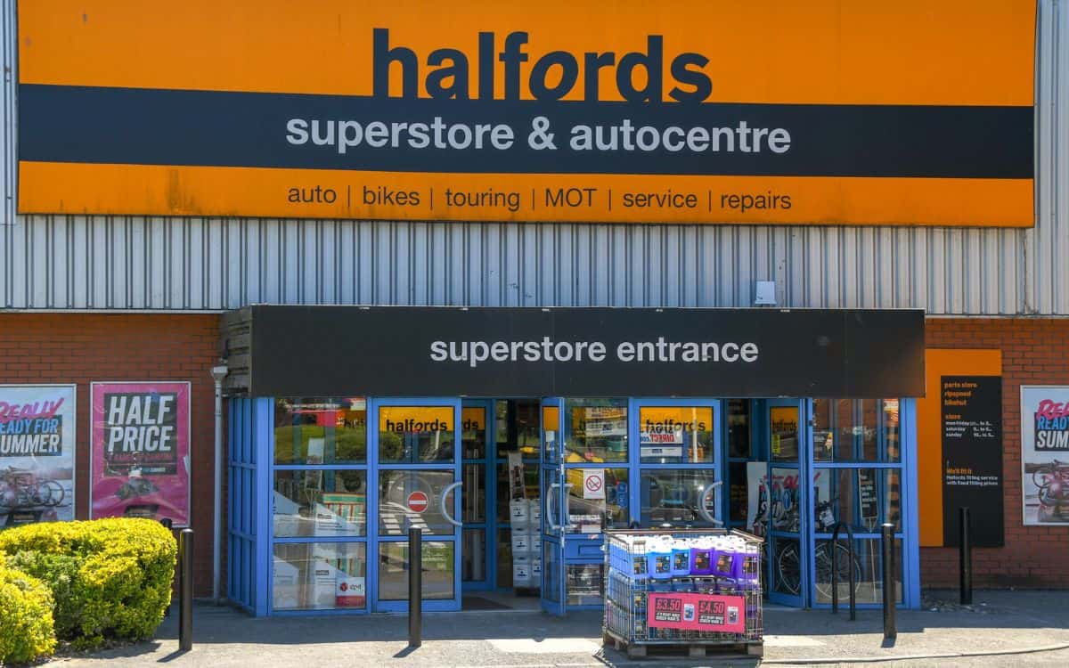 Photo of a large store with name halfords above the entrance