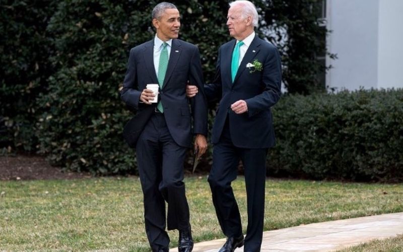 Photo of Joe Biden while walking with former US President Barrack Obama