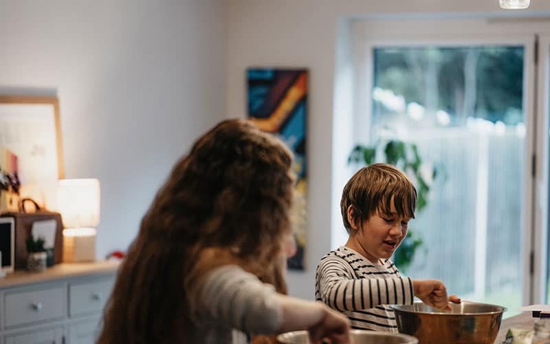 Kids baking a Norman Castle cake