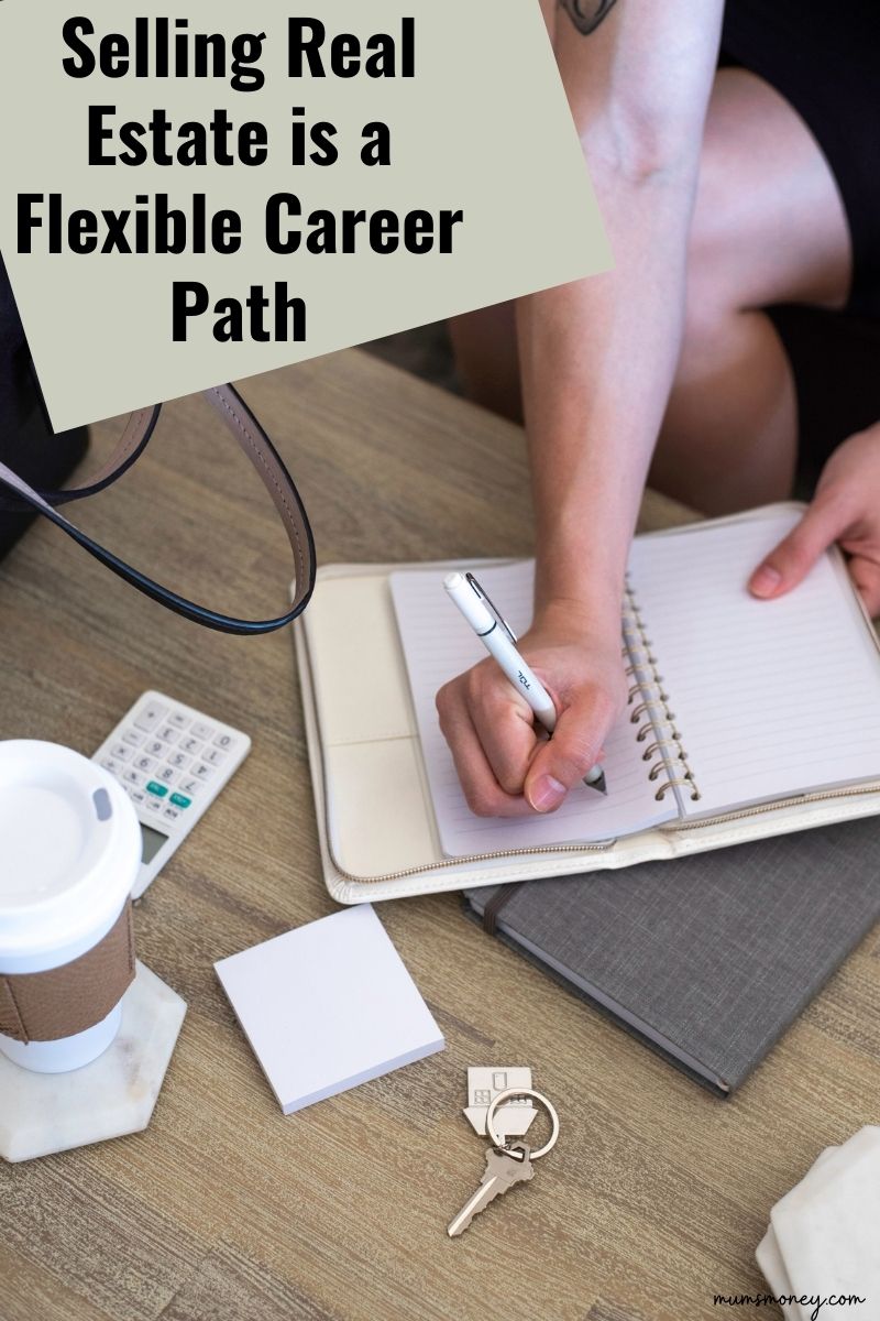 Woman writing in notebook with house key on coffee table and text overlay that reads "Selling Real Estate is a Flexible Career Path"